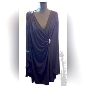 Black cocktail dress with attached cape